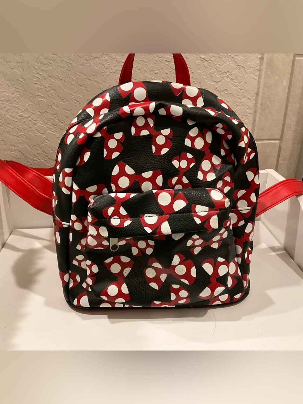 Disney Black Mini Backpack with Red & White Bow Print